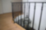 Leuning met gietijzeren spijlen