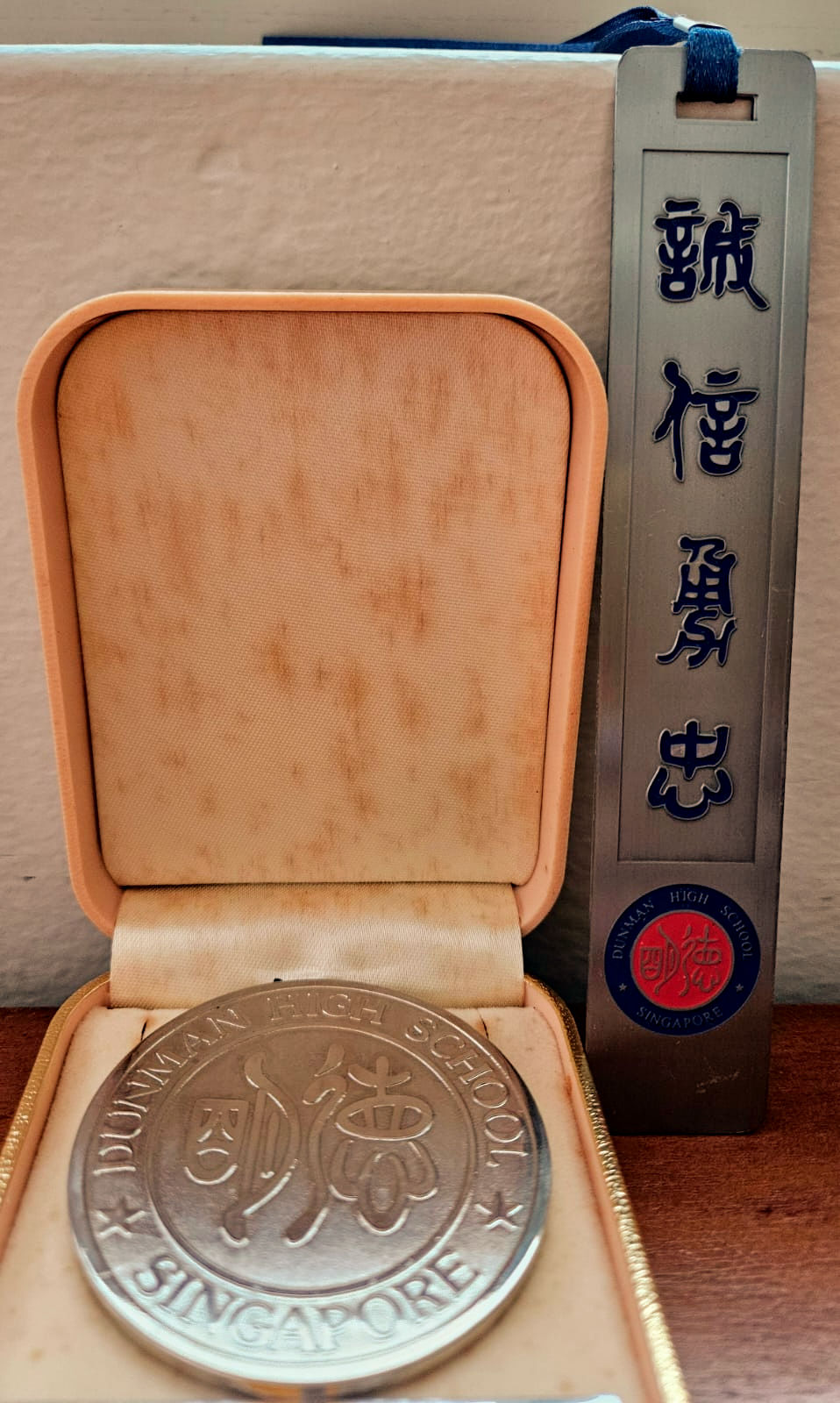 Dunman High bookmark and medal
