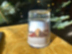 front of sand art shot glass paperweight