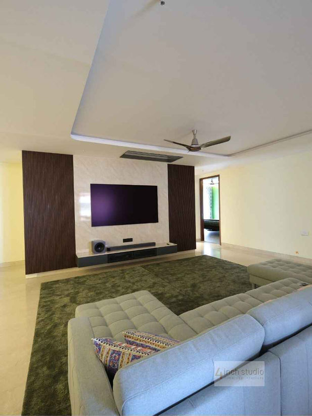 Modern TV unit design for living room in Pranava One Panjagutta Hyderabad 3BHK interiors by Team4 Nyla