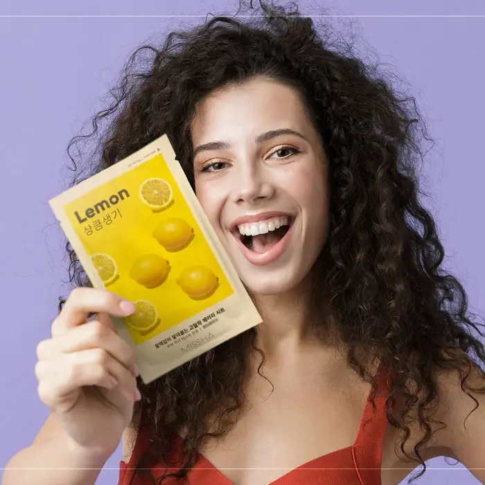 MISSHA Airy Fit Sheet Mask (Lemon) with a girl