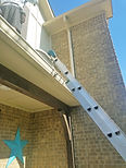 Protect rain gutters from ladders.