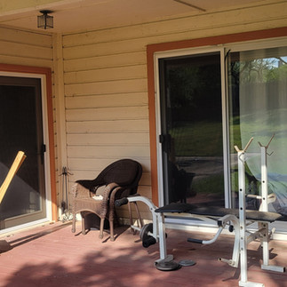 Two sliding patio doors with custom insect screens