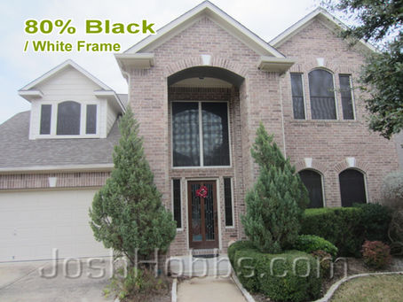 How do solar window screens act as a home energy efficiency solution?