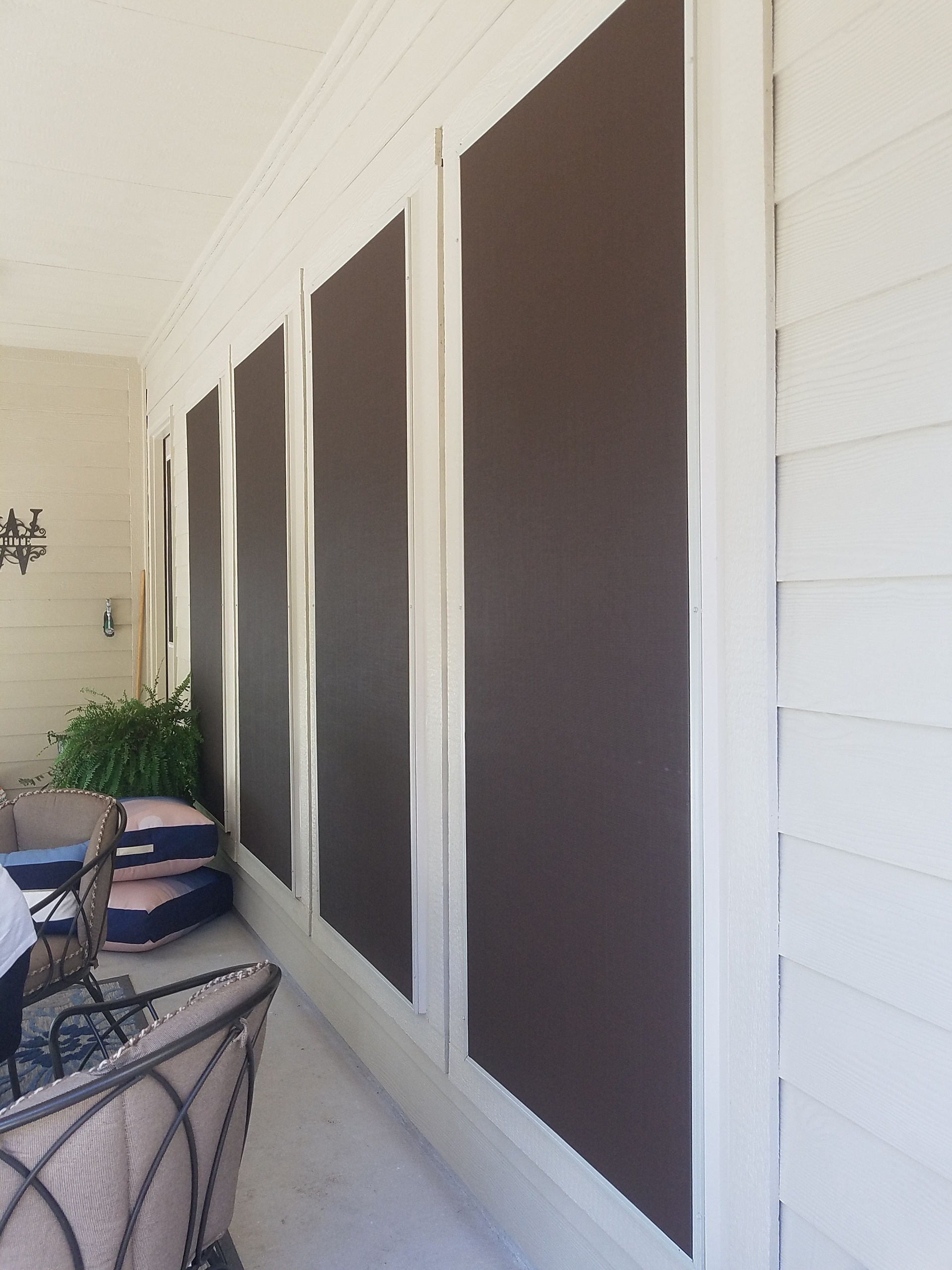 This homeowner even put solar screens on the windows under patio.  She did this for uniformity.