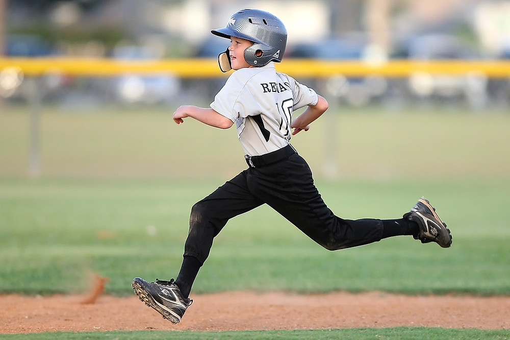 Active boy playing baseball