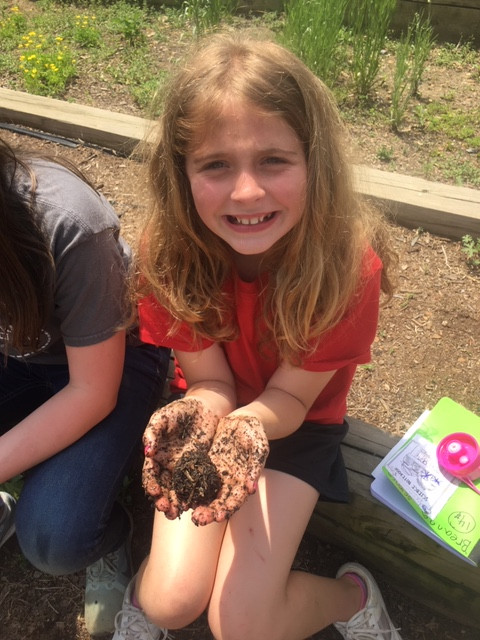 Students at The Learning Center Charter School regularly play in the dirt.