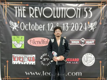 Isiel, personal trainer and MMA coach at Ampersand Fitness, competing in The Revolution 153 Brazilian Jiu-Jitsu tournament on October 12–13, 2024