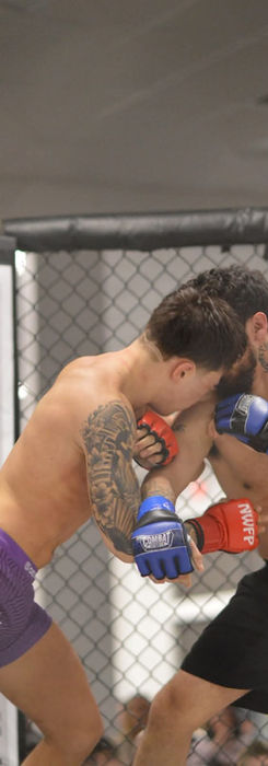Isiel, personal trainer and MMA fighter, inside the cage during a mixed martial arts match