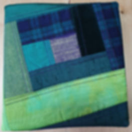 Fabric covered notebook. Patchwork, hand dyed and commercial cotton.