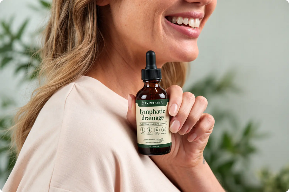 Woman holding Lymphoria bottle