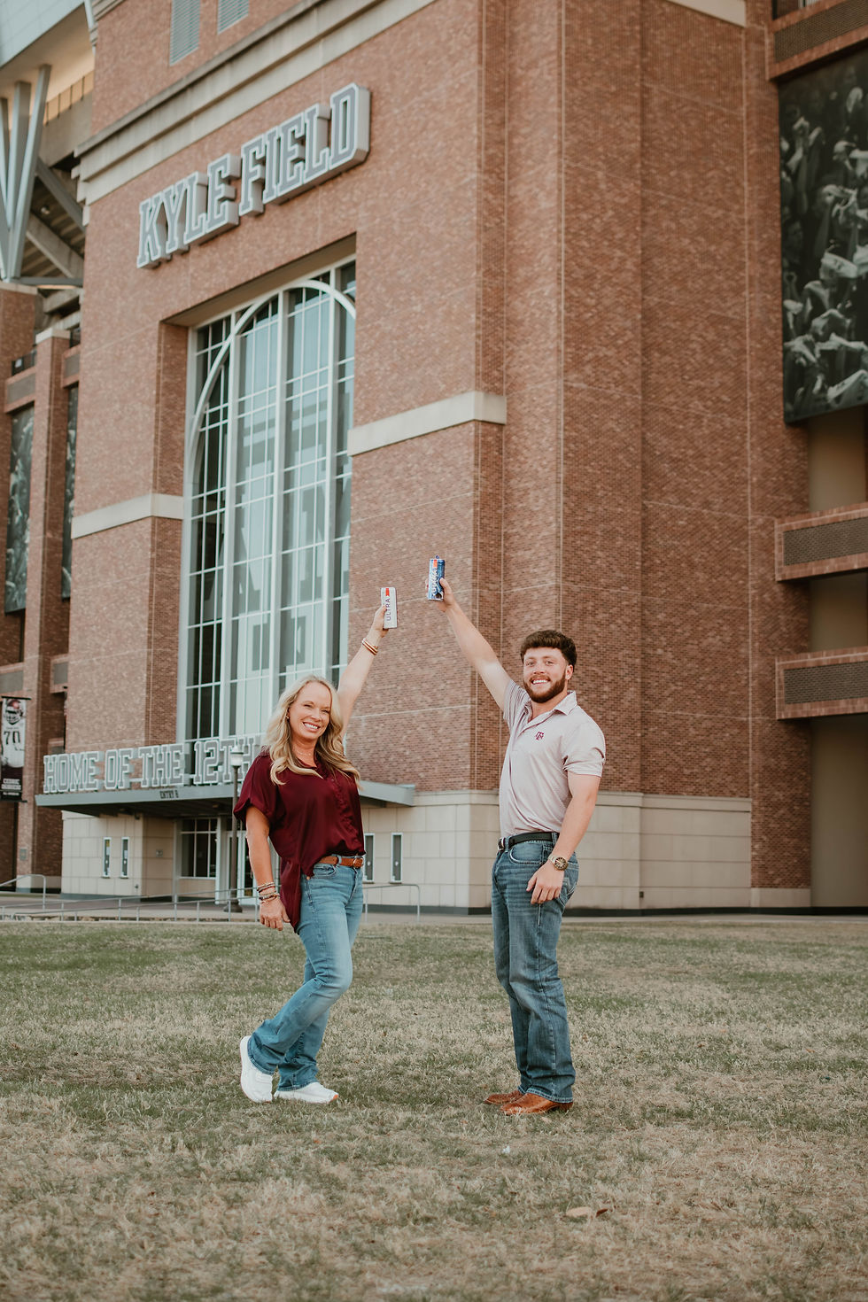 A Texas A&M senior and grad celebrating after shotgunning a beer with his mom for senior photos