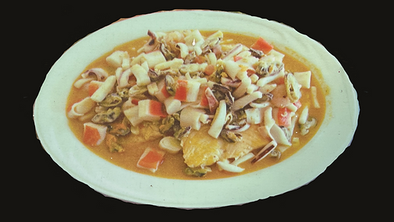69.- Salmon con Mariscos