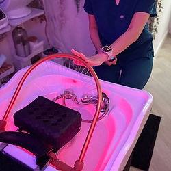 Advanced halo dome equipment used in The Root Reboot to stimulate circulation and promote scalp wellness