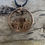 Thumbnail: Star gazing hares pendant – hand cut penny coin with circular scene and moon detail