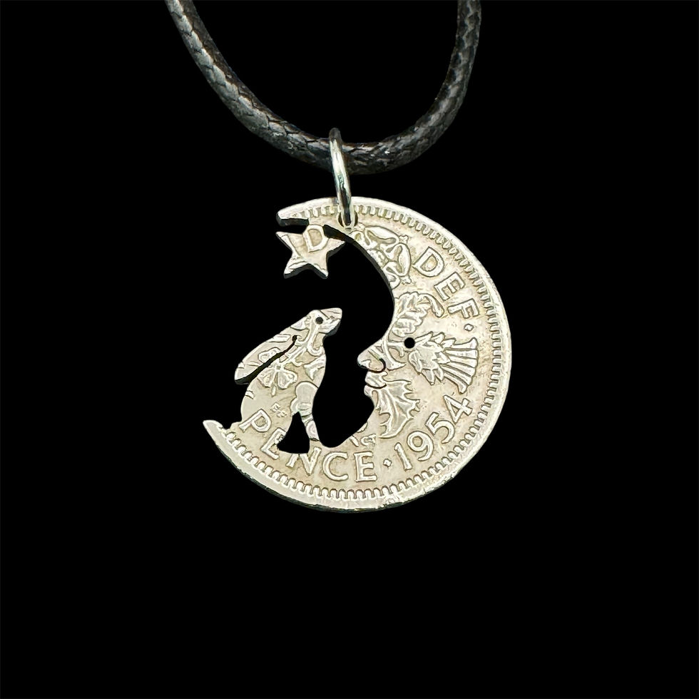 Handmade moon gazing hare necklace with crescent moon – cut from vintage sixpence coin