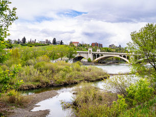 Bow River by Center Street Bridge Riverwalk Calgary copyright Albertine Huizing, Magnolia Group Real Estate Calgary