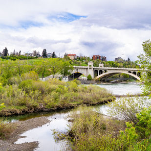 Bow River by Center Street Bridge Riverwalk Calgary copyright Albertine Huizing, Magnolia Group Real Estate Calgary