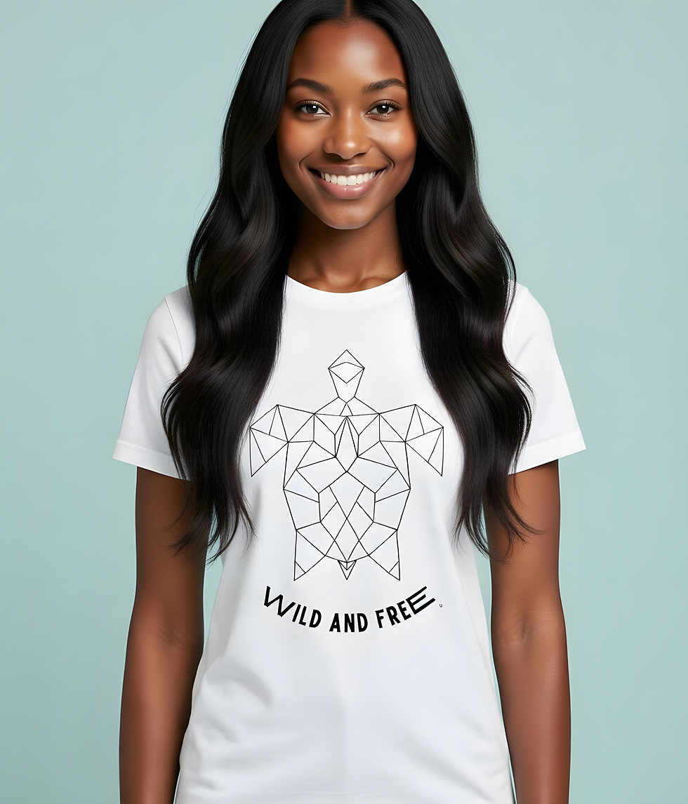 Thumbnail: Woman wearing a clean white fitted tee featuring the geometric turtle Wild and Free design in a bright studio.