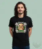 Black unisex t-shirt worn by smiling man with long hair, "Vegan" cute chick bones spooky cartoon.