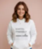 Woman wearing white unisex vegan quote Earth Friendly Animal Loving hoodie