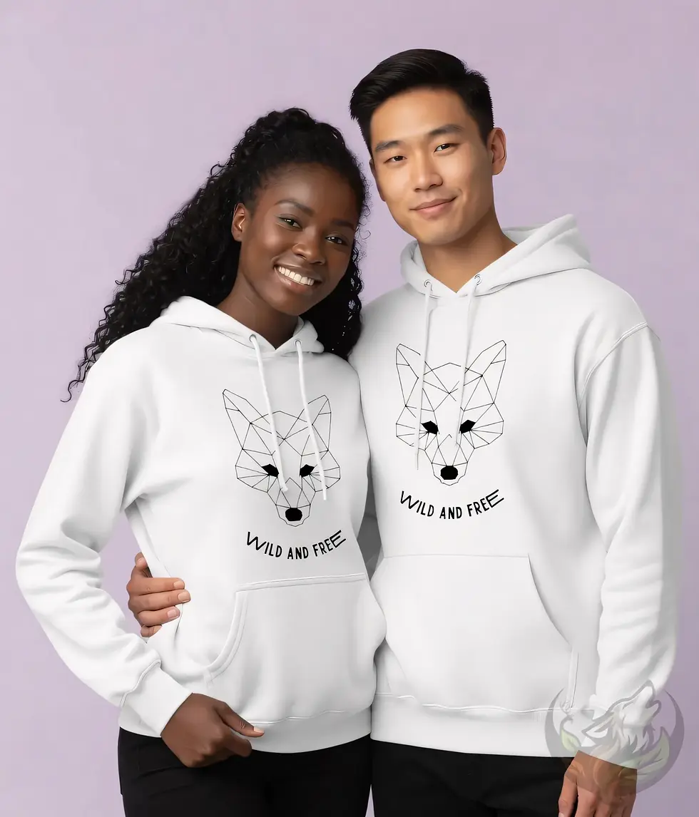 Thumbnail: White unisex hoodie with black geometric fox head graphic and "WILD AND FREE" slogan.