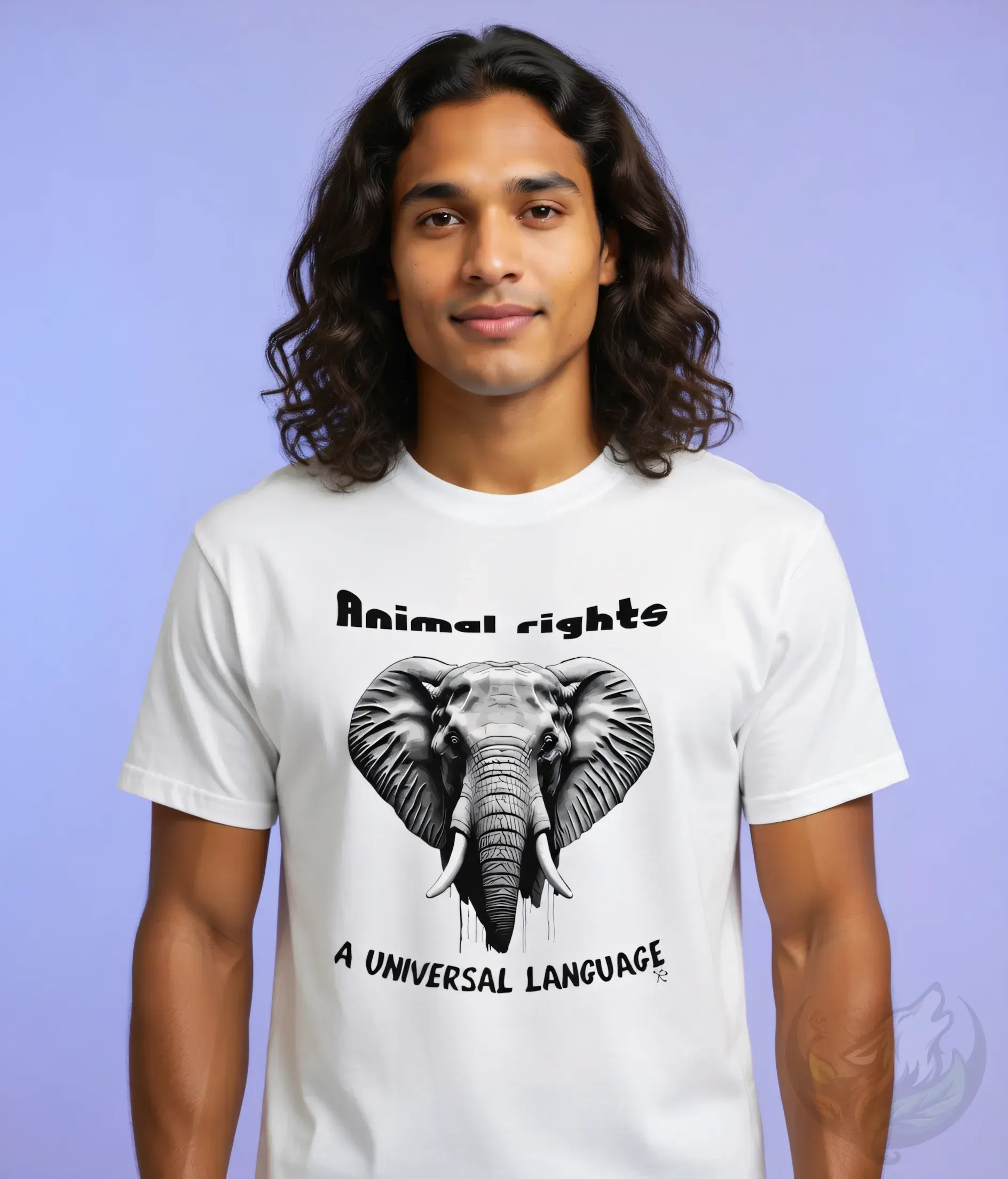 White unisex t-shirt worn by man with long wavy hair, "Animal rights A Universal Language" elephant graphic.