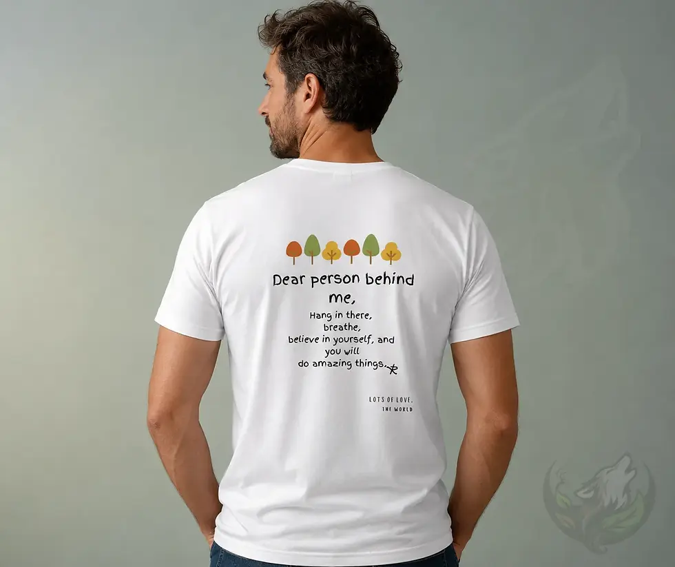 Man in white unisex shirt studio pose showing Dear Person Behind Me back print with positive message design