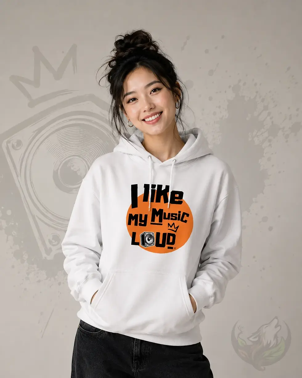 Thumbnail: Woman wearing a white I Like My Music Loud hoodie with a bold orange music graphic in a modern studio portrait
