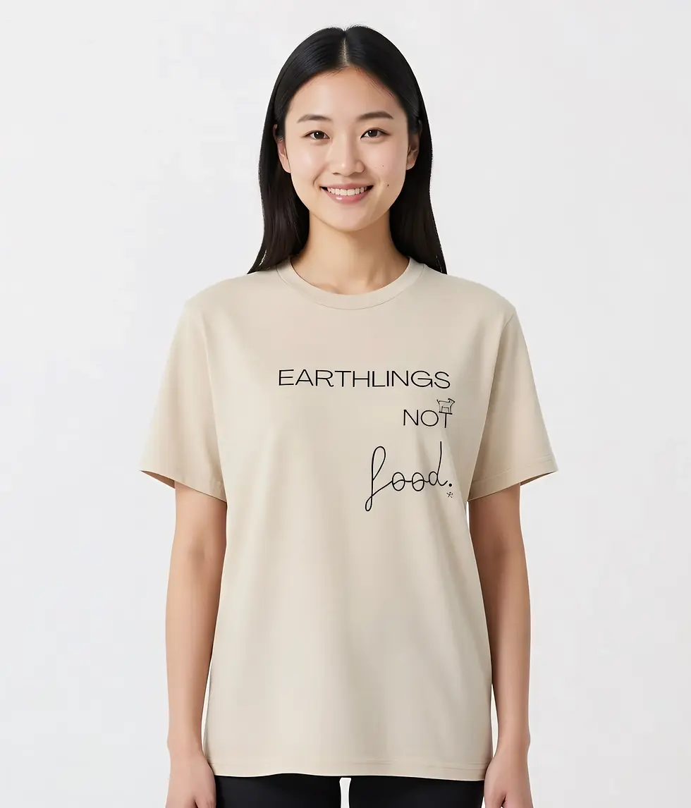 Thumbnail: Natural scoop shirt with the message “Earthlings not food” in a minimalist vegan design, worn against a neutral background.