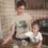 Thumbnail: Woman in beige Big Dill pun shirt baking with a child in a warm kitchen scene filled with ingredients and family vibes.