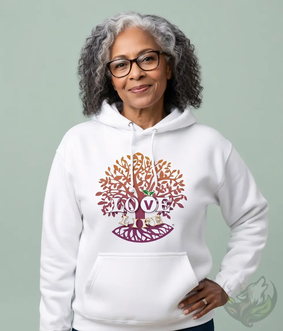 Thumbnail: Older woman wearing a white hoodie featuring the Love Life tree design on the front