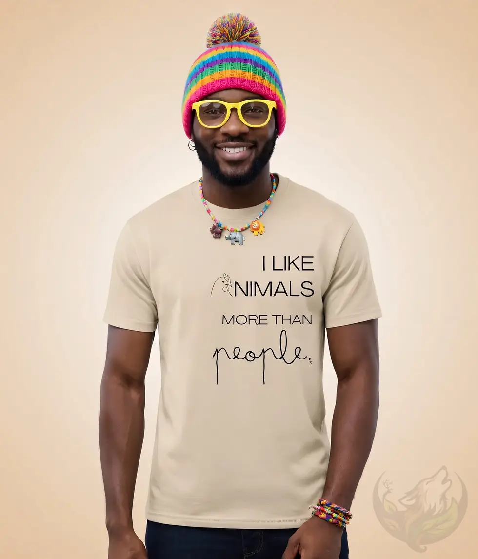Thumbnail: Natural unisex t-shirt worn by smiling man with colorful hat and glasses, "I Like Animals More Than People" fun vegan quote.