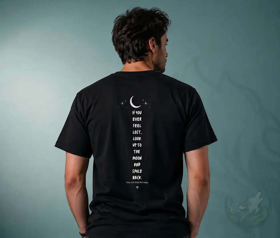 Man wearing black unisex shirt back design with moon, stars and inspirational lost quote artwork