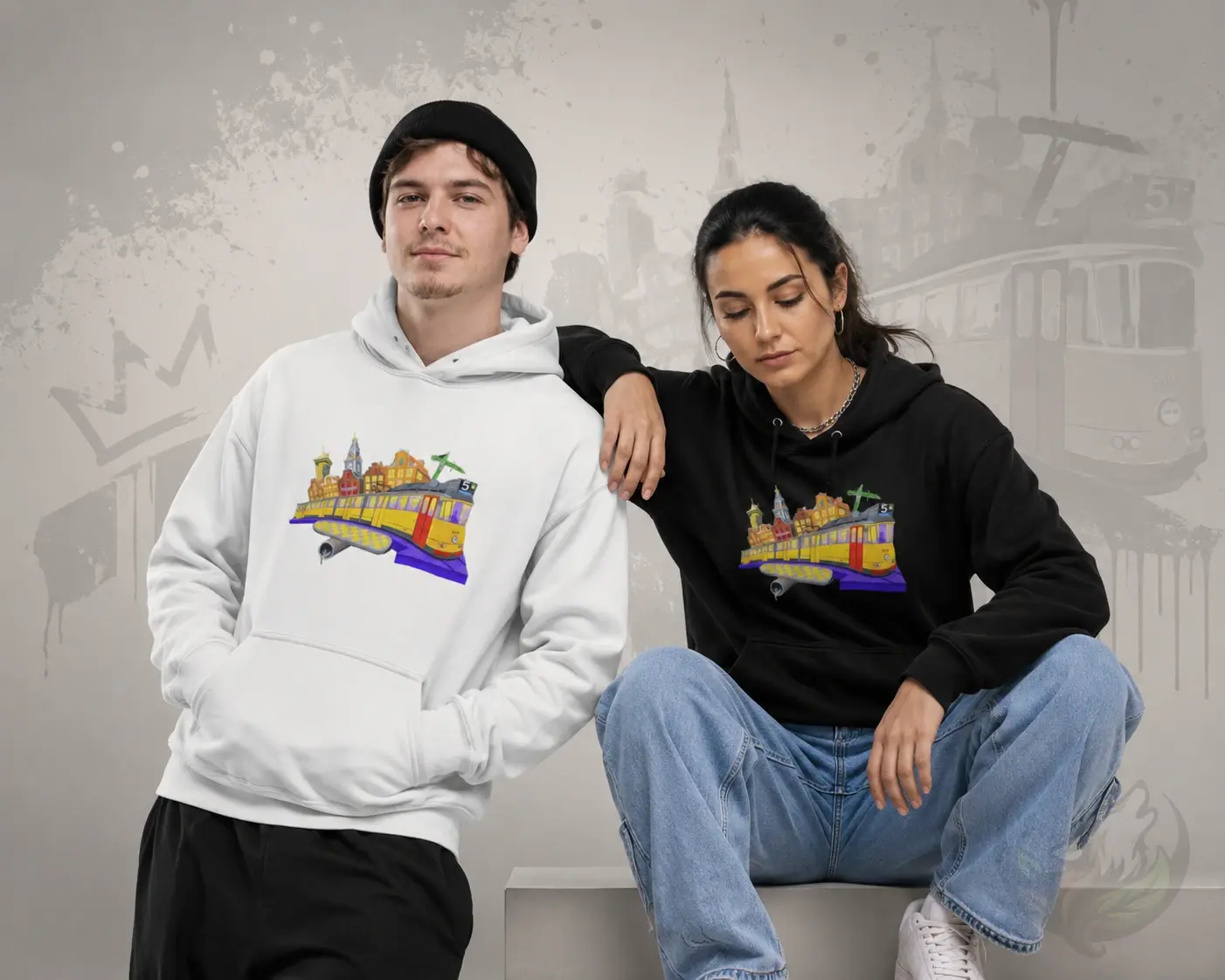 Couple wearing Official DefP Tram 5 Unisex Hoodies in white and black featuring the Tram 5 artwork.