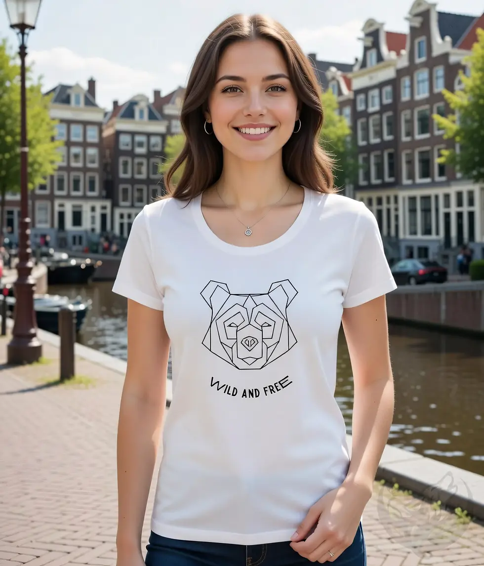 Thumbnail: Woman wearing a high‑quality white scoop neck tee with geometric bear Wild and Free design in a natural lifestyle s