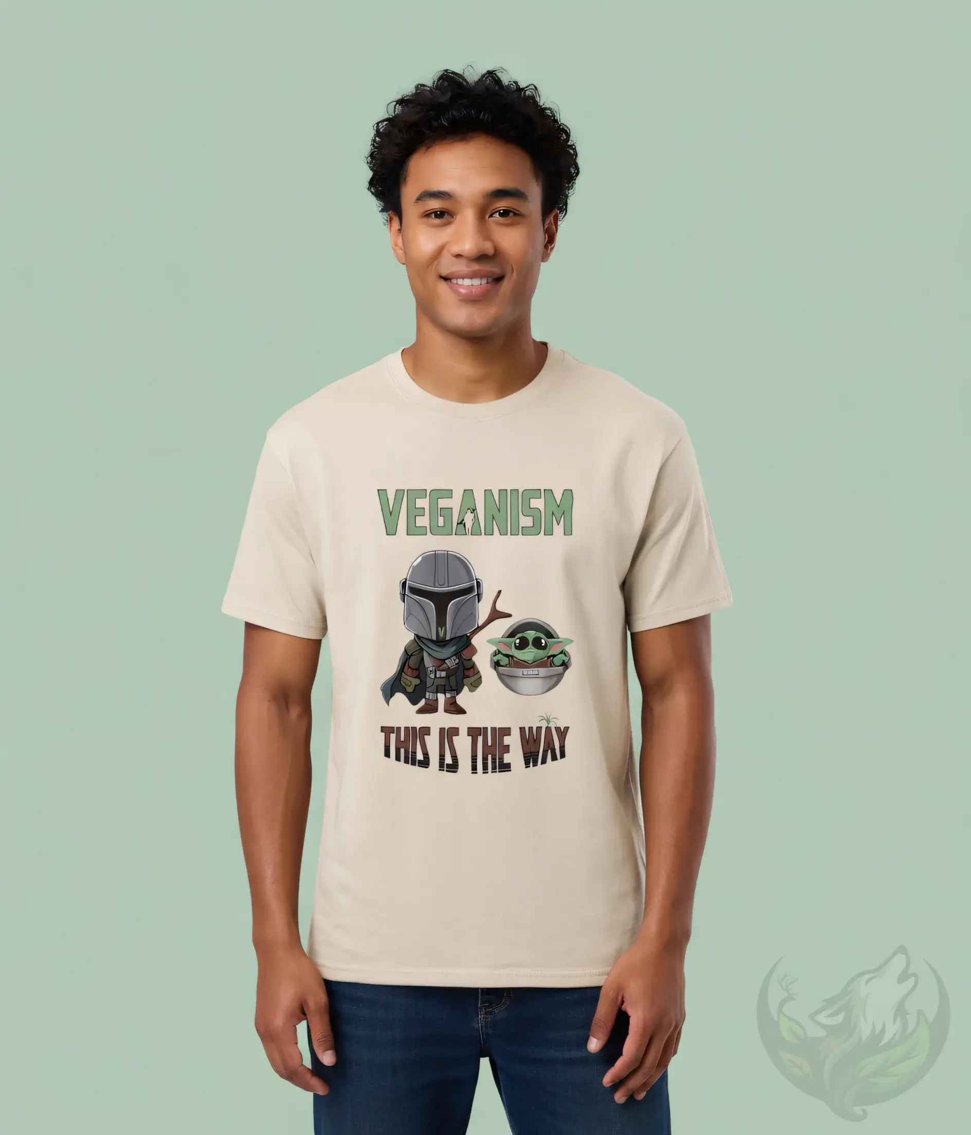 Natural unisex t-shirt worn by smiling man with curly hair, Veganism Mando and Grogu "This is the Way" design.