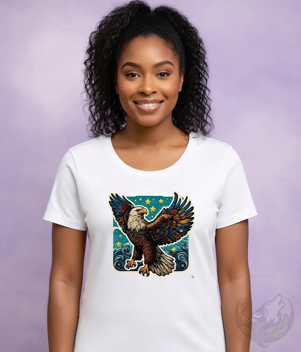 Thumbnail: White scoop neck t-shirt on smiling woman, colorful eagle design with wings spread in teal starry accents on chest