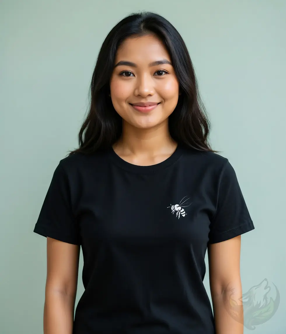 Thumbnail: Smiling woman with long dark hair wearing a black fitted t-shirt with a delicate minimalist bee line art on the left chest.