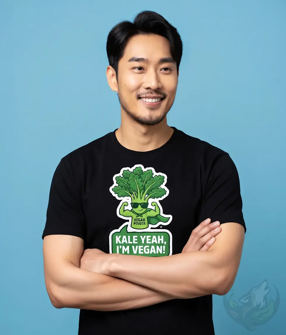 Black unisex t-shirt worn by smiling man, "Kale Yeah, I'm Vegan!" muscular kale superhero cartoon.
