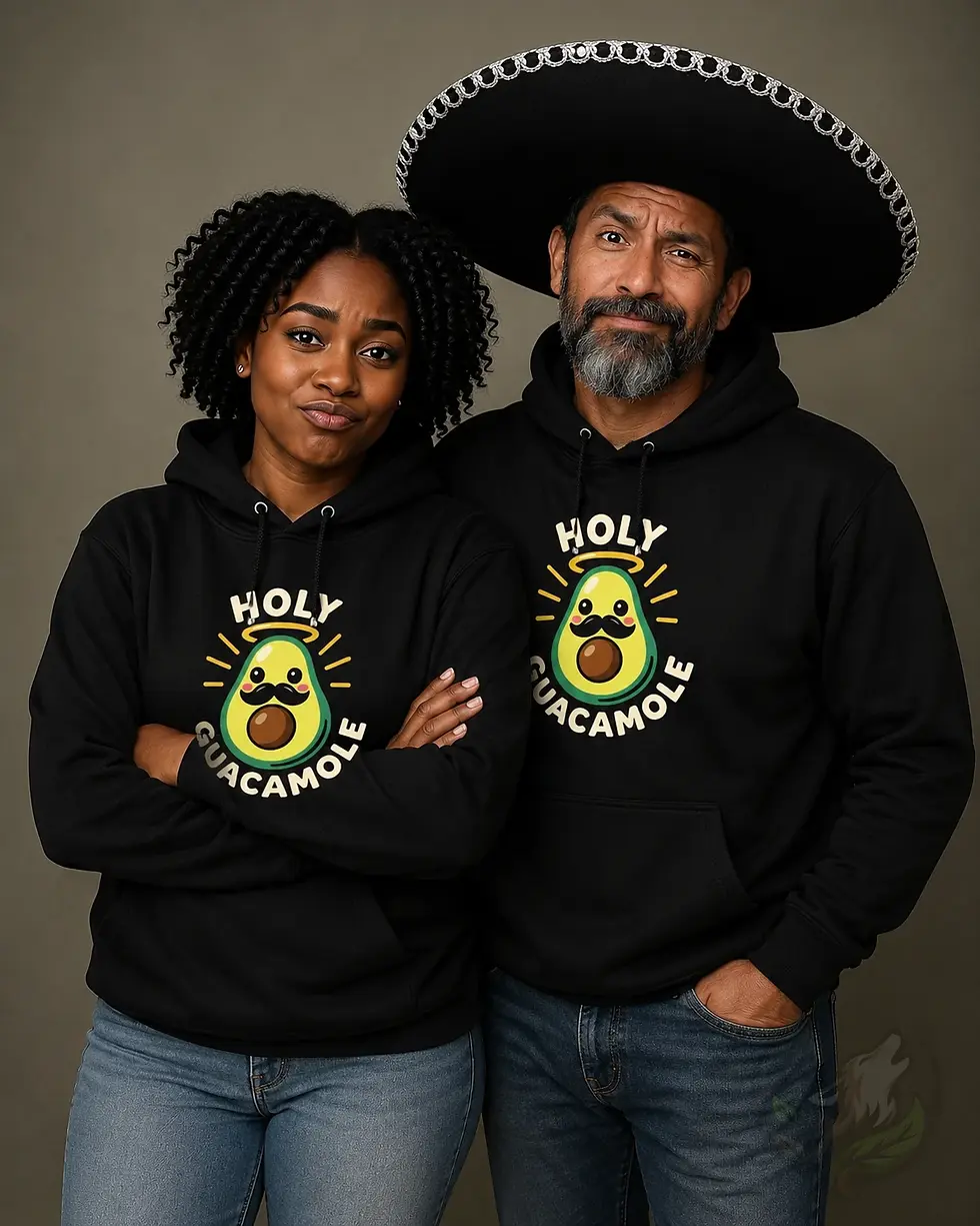 Smiling woman wearing a black unisex hoodie featuring the funny Holy Guacamole avocado front design.