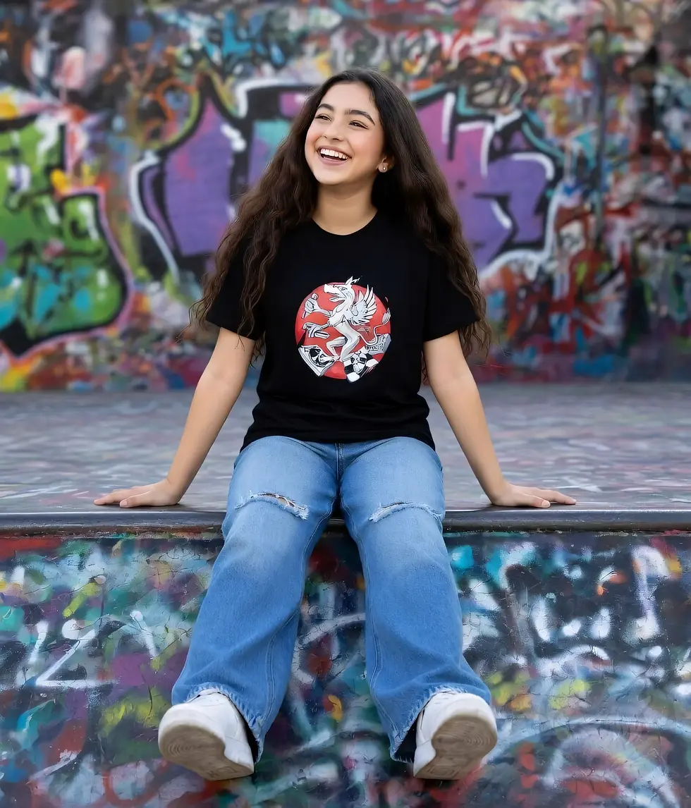 Thumbnail: Person sitting on a graffiti ramp wearing a black fitted tee with Def P’s Griffin artwork