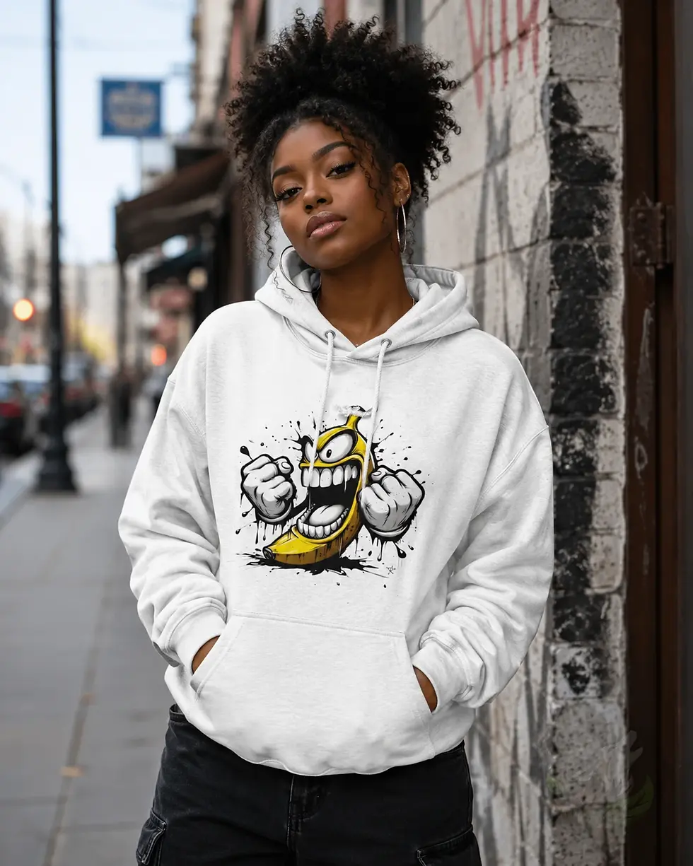 Woman wearing a white unisex hoodie featuring an angry graffiti banana design.