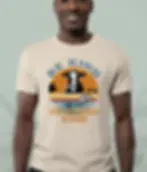 Natural unisex t-shirt close-up on smiling man, "Be Kind To Every Kind" animal kindness illustration.