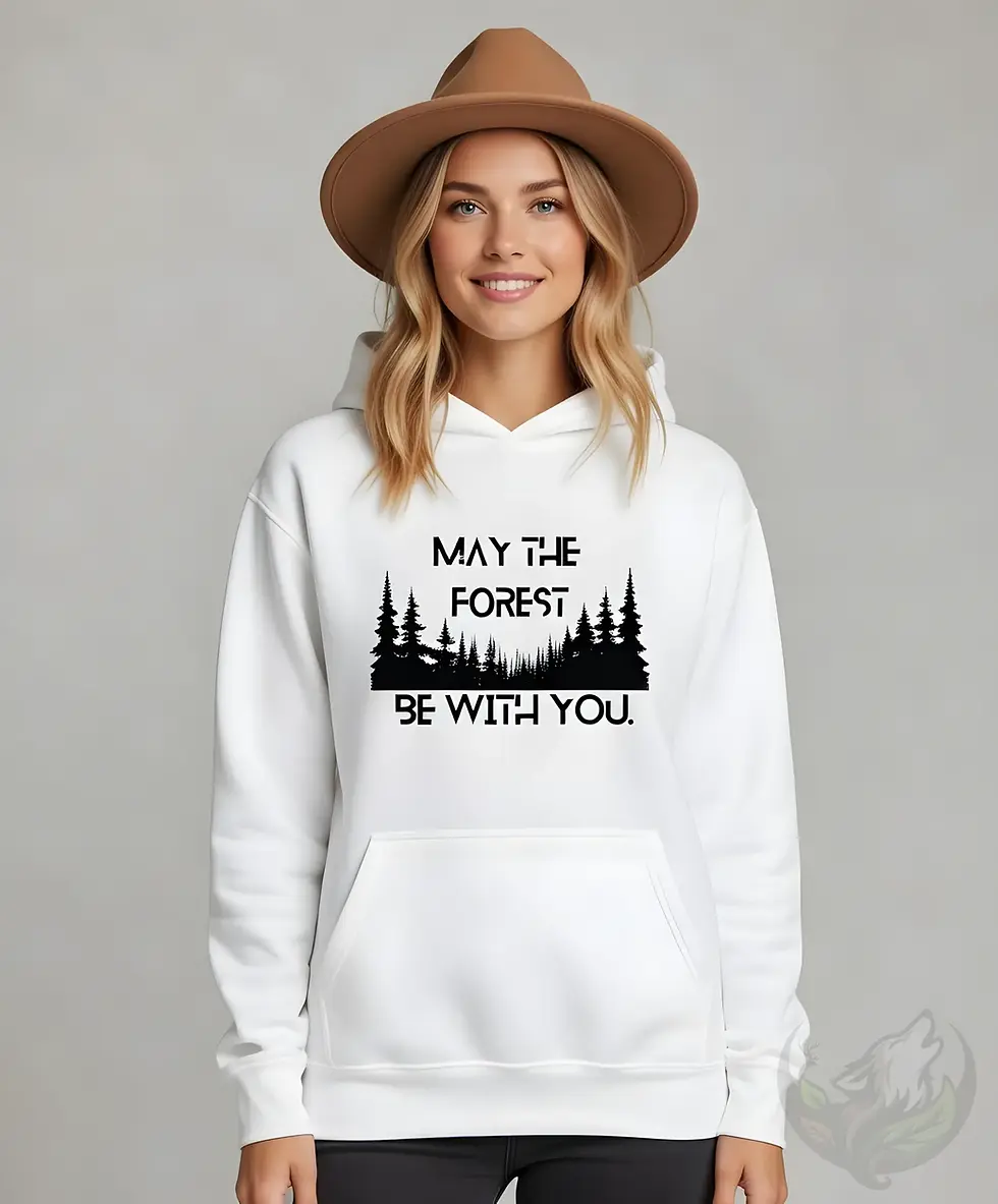 Woman wearing a white unisex May The Forest Be With You hoodie in a studio with a brown hiking hat