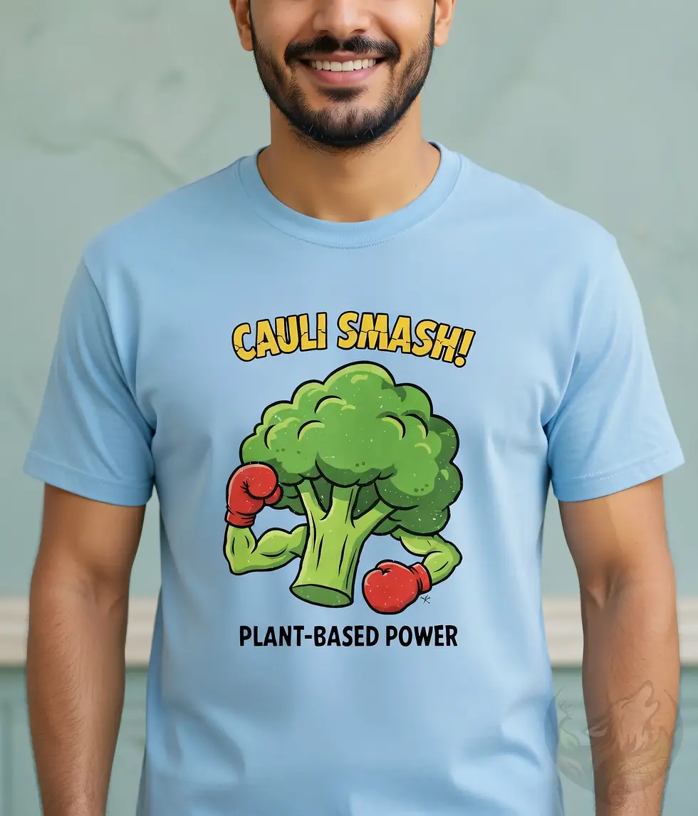 Thumbnail: Light blue unisex t-shirt close-up on smiling man, "Cauli Smash! Plant-Based Power" fun cauliflower illustration.