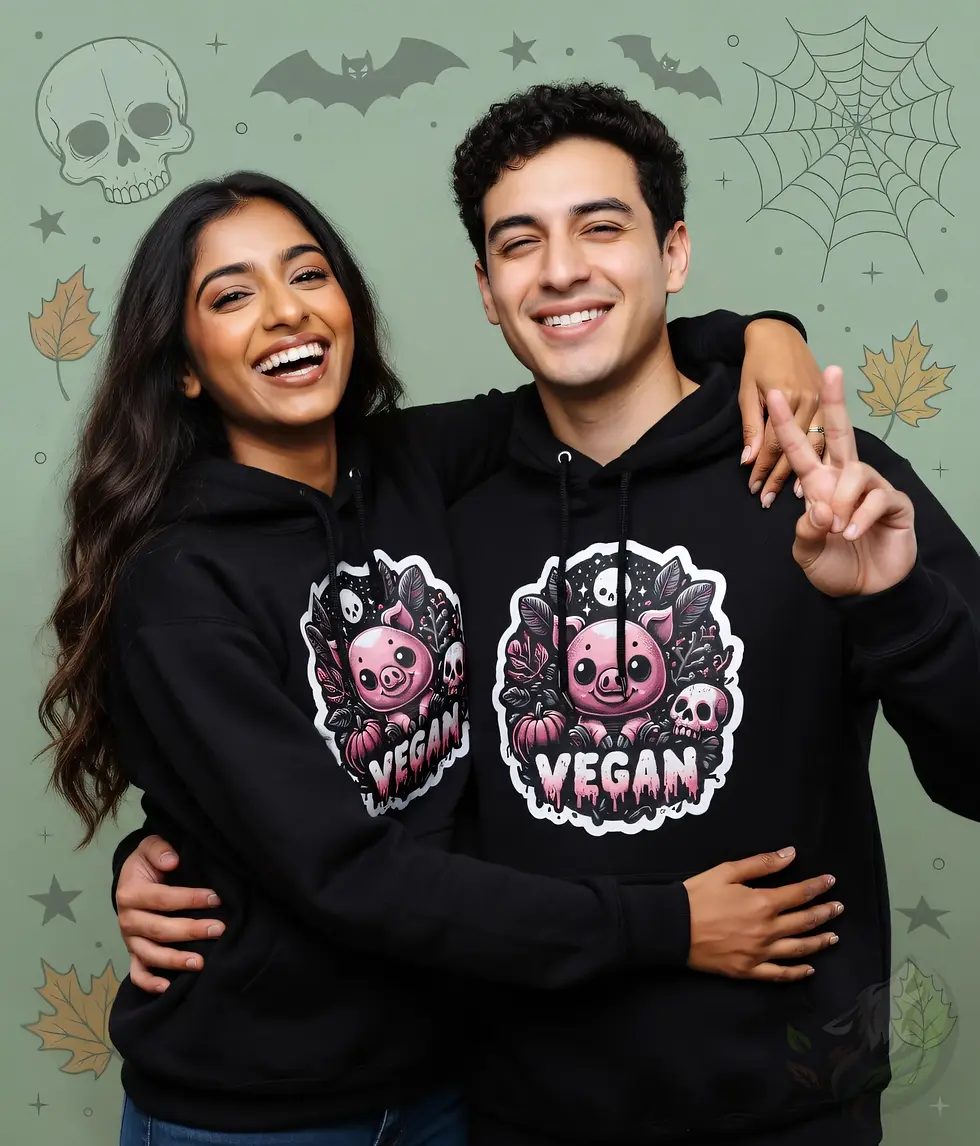 Thumbnail: Black unisex hoodie on happy couple, playful pig with skulls and bold "VEGAN" slogan.