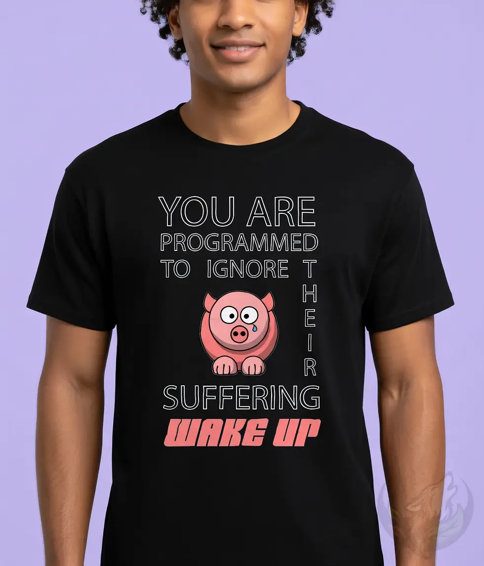 Black unisex t-shirt close-up on man, "You Are Programmed To Ignore Their Suffering WAKE UP" vegan message.