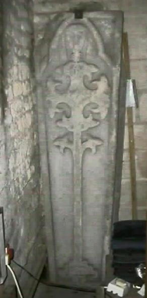 A full length tomb lid with calvary cross and head