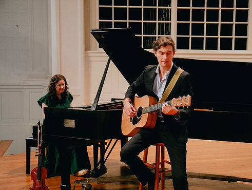 Ben Harte Hutchinson and Stephanie Screen collaborating in hymn writing on Steinway piano and guitar as part of Redeemer Records